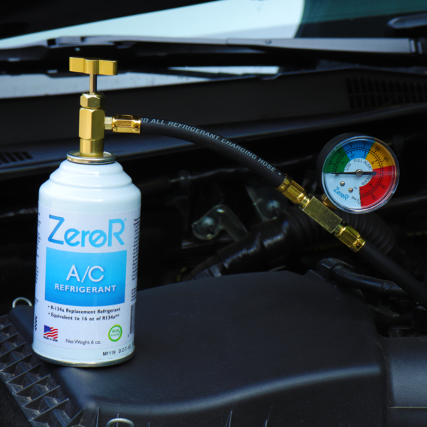 ZeroR AC Refrigerant and Can Tap sitting in engine bay